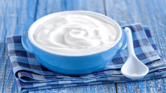 Natural yogurt in a blue bowl © fotolia Photo: ji_images