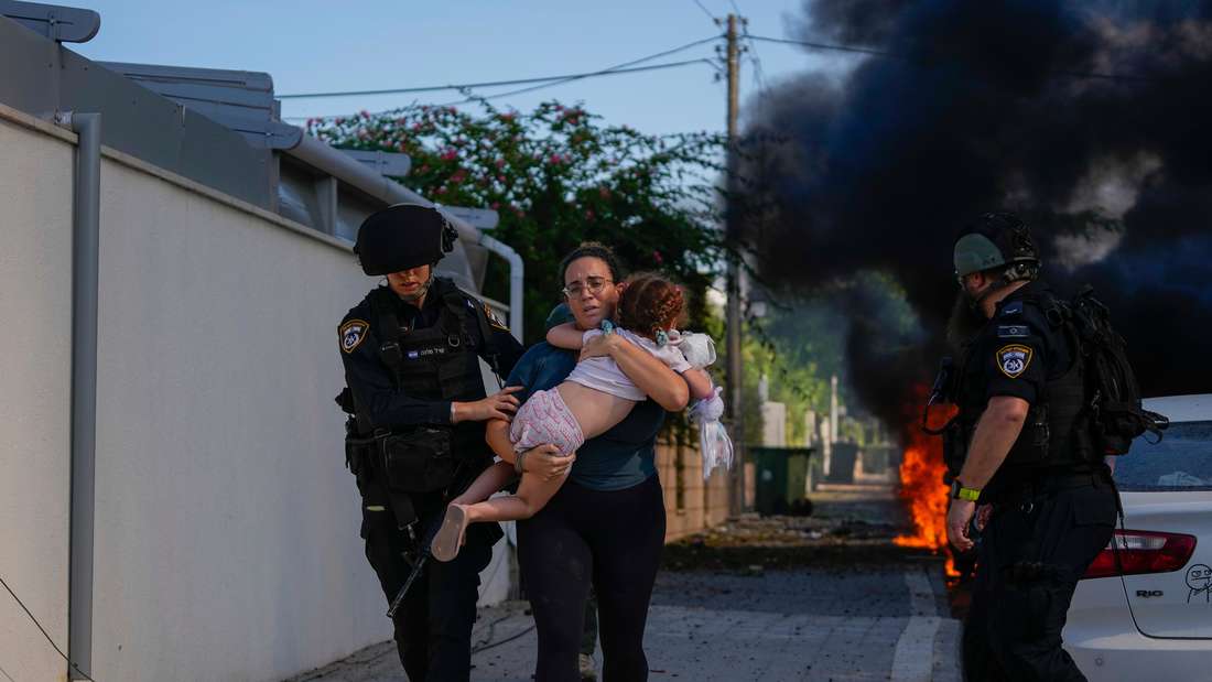 Israeli police evacuate woman and child in Israel war 